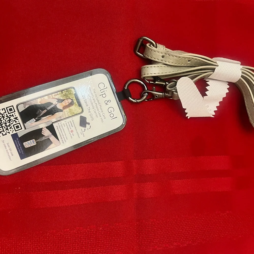 Teacher gift STG strap converts phone case into hands free holds lanyard